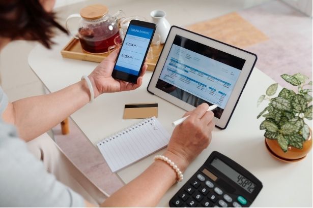 Bookkeeper reviewing monthly financial records